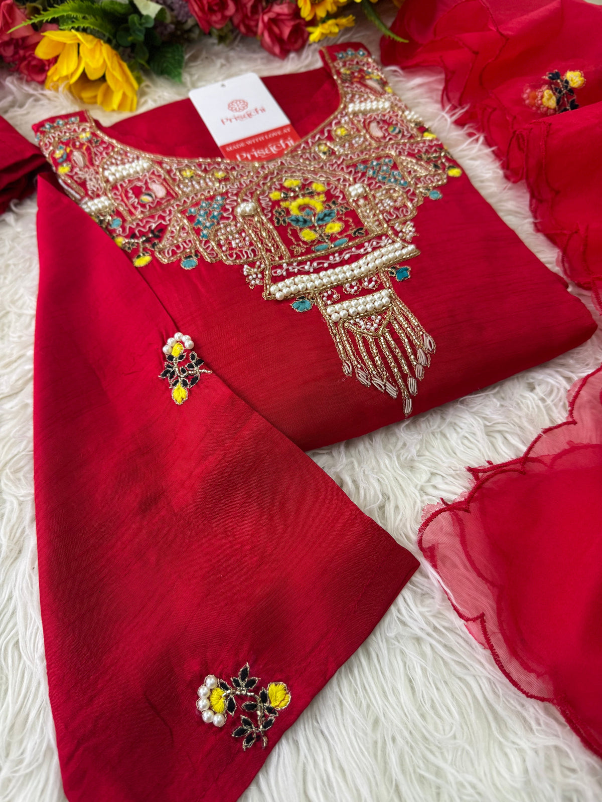 Red embroidered kurta set with dupatta